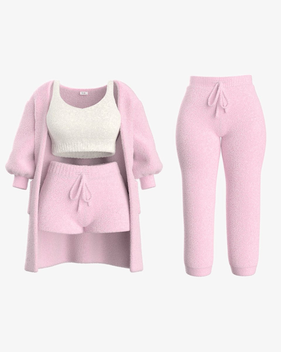 Roze fleece set bestaande uit een comfortabele top, trui en broek, ideaal voor warmte en gezelligheid.