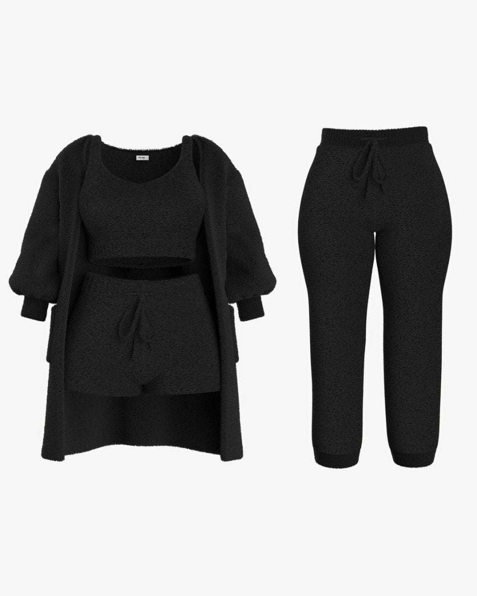 Zwart fleece set, bestaande uit een top, trui en broek, perfect voor comfort en warmte.