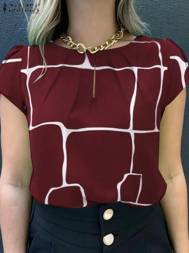 Blusa elegante con mangas cortas y estampado