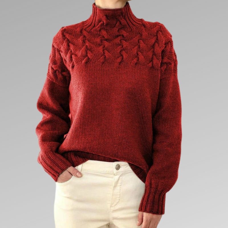 Zimora veelzijdige casual trui in rood met een stijlvol gevlochten patroon op de schouders en een hoge kraag. De trui heeft een comfortabele pasvorm en lange mouwen, ideaal voor een warme en trendy look. Perfect te combineren met lichte broeken voor een opvallende outfit.