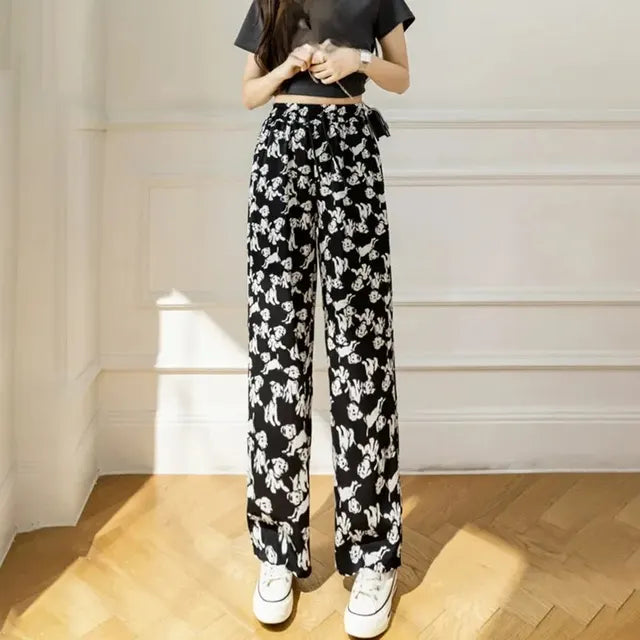 Pantalones acampanados de talle alto a rayas monocromáticas de Luna Stijl