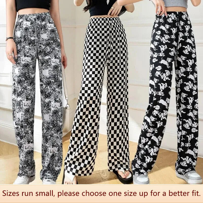 Pantalones acampanados de talle alto a rayas monocromáticas de Luna Stijl