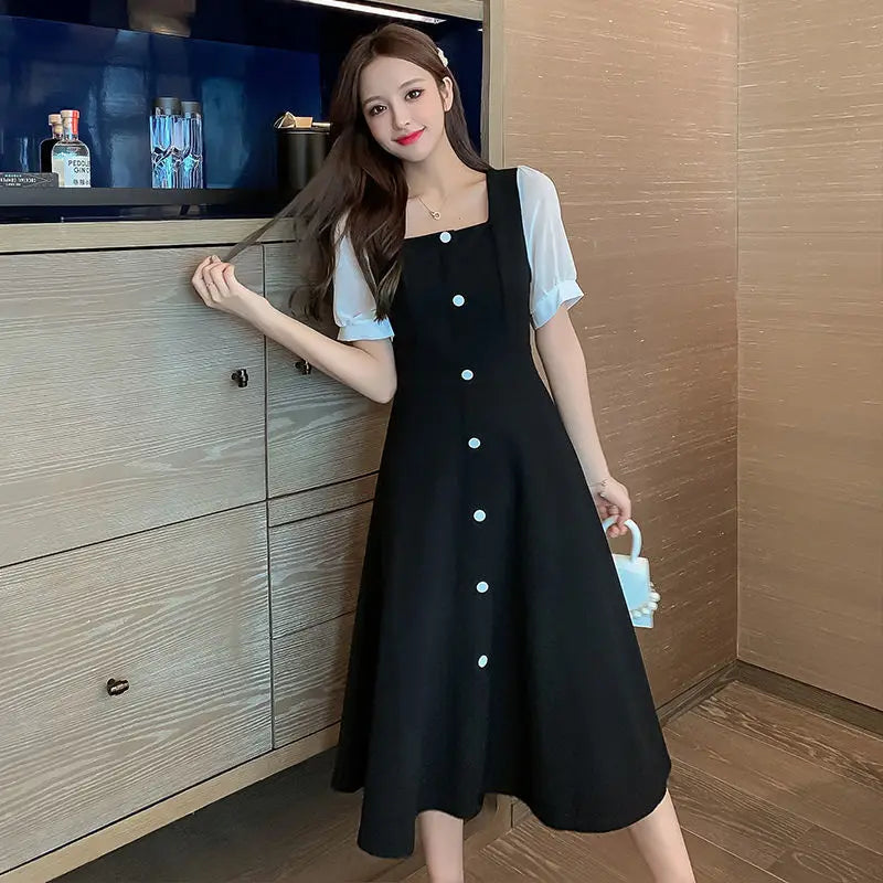 Elegante Zomerse Midi Jurk van Vintage Flair