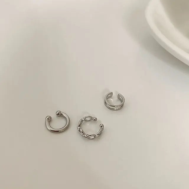 Glamourous Glow Irregular Cross Zircon Ear Clips