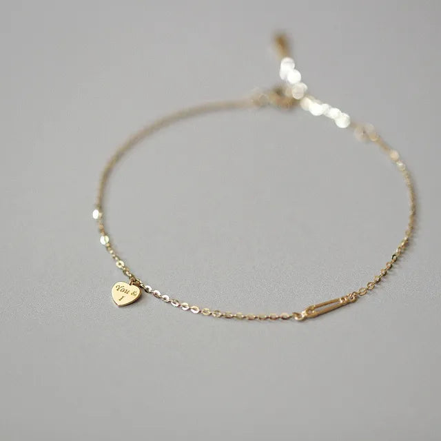 Luna Sterling - Braccialetto a cuore raffinato in argento placcato oro