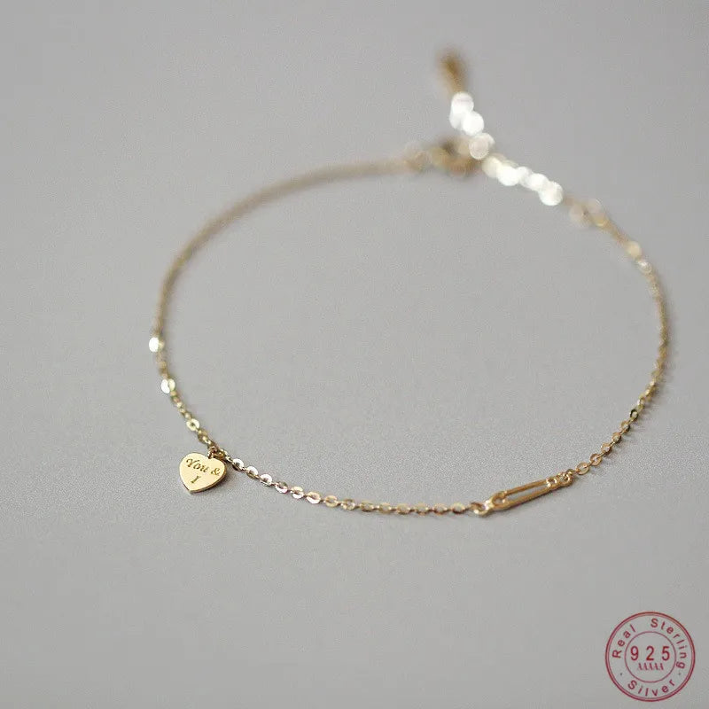 Luna Sterling - Braccialetto a cuore raffinato in argento placcato oro