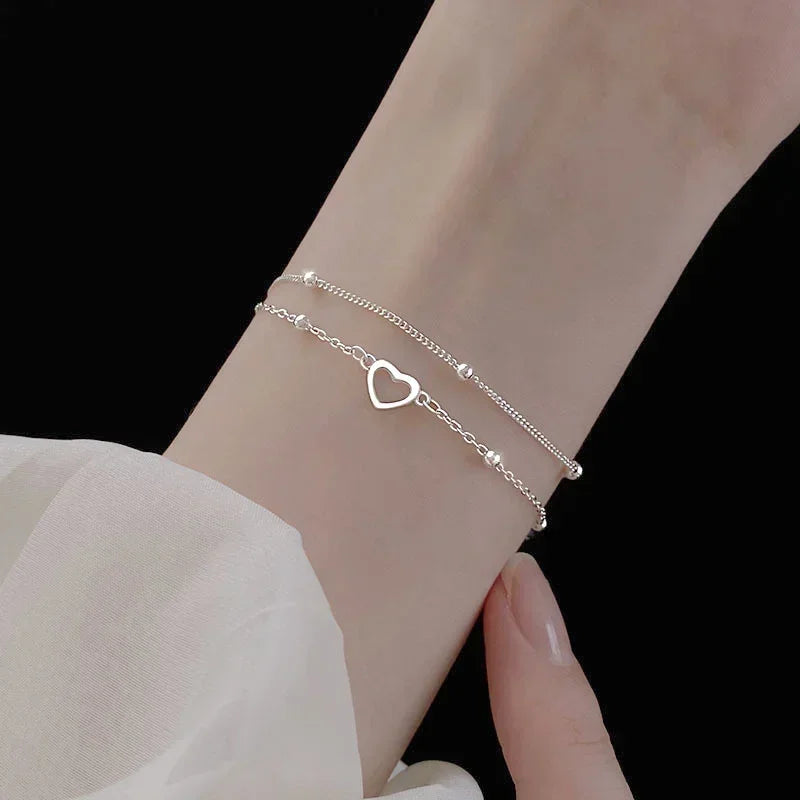 Betoverende 925 Sterling Zilveren Dubbele Liefde Hart Holle Ronde Kralen Armband