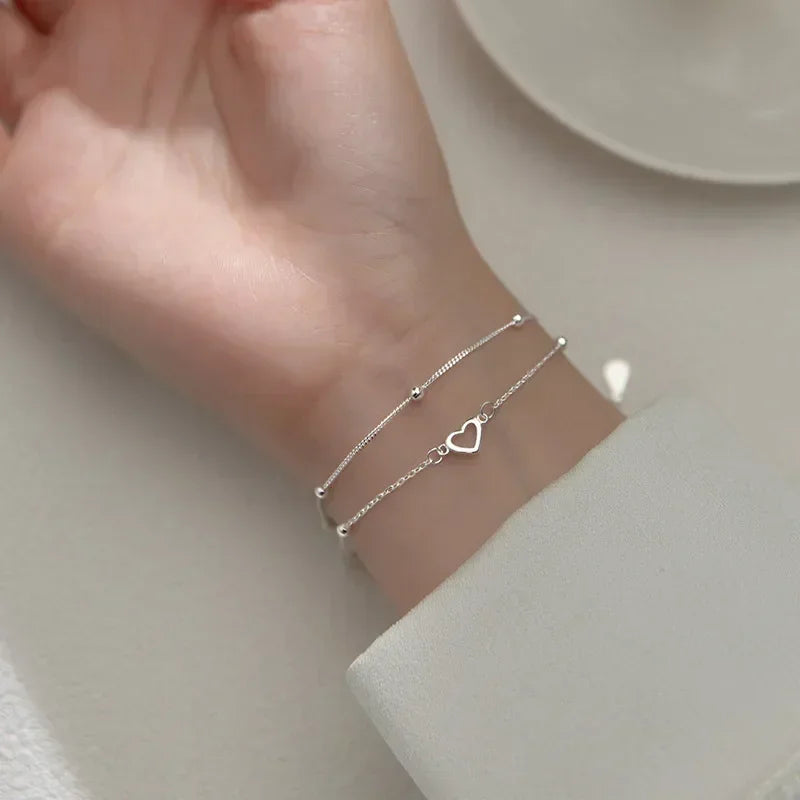 Betoverende 925 Sterling Zilveren Dubbele Liefde Hart Holle Ronde Kralen Armband