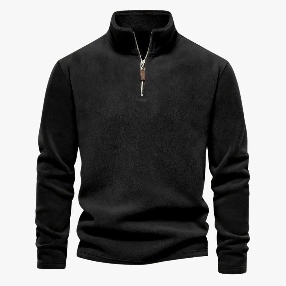 Stijlvolle en casual Bastian trui in zwart, met halve ritssluiting en opstaande kraag. Ideaal voor een moderne, comfortabele en veelzijdige look.