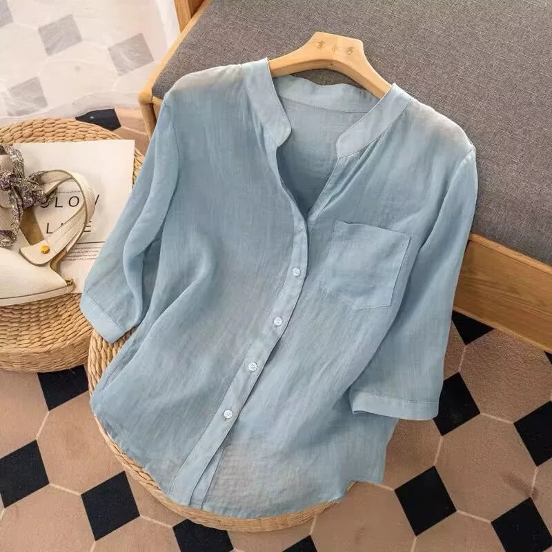 Elegante camicetta da donna in cotone leggera con scollo a V