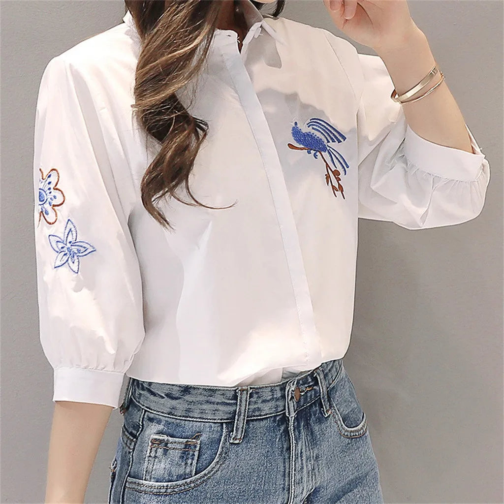 Elegant Embroidered Blouse with Three-Quarter Sleeves