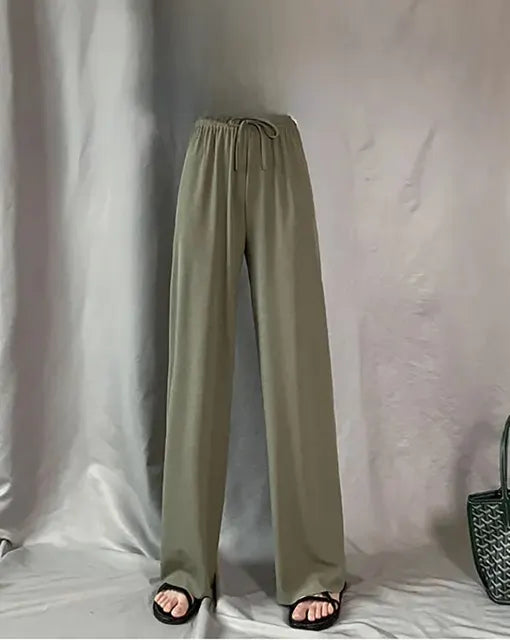 Pantaloni eleganti da donna con fondo a campana drappeggiato in seta ghiaccio e vita alta con gamba dritta
