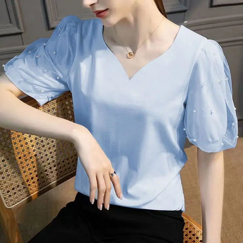 Bellissima Chic Camicia con Scollo a V a Cuore Pesca Perlacea per la Donna Moderna!