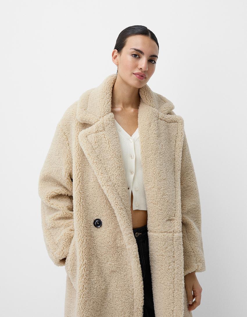 Christina | Twee-rij Teddy-jas met knoopplacket in extra grootte