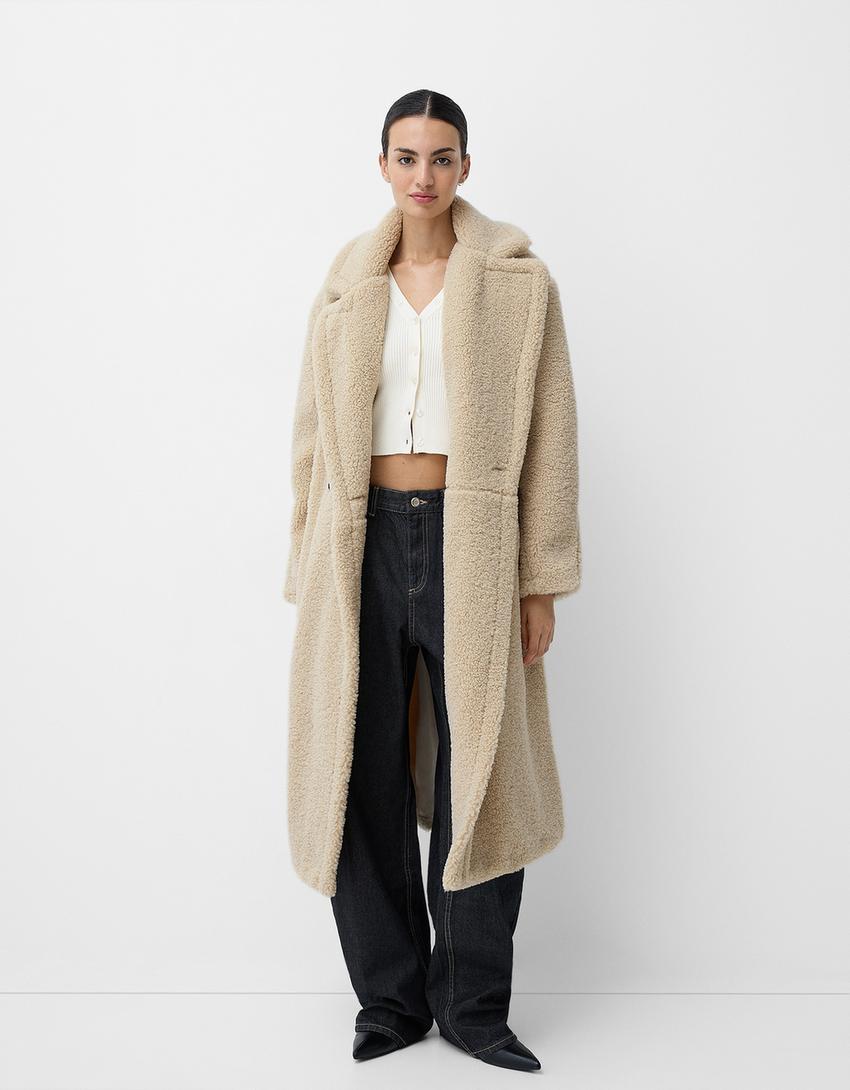 Christina | Twee-rij Teddy-jas met knoopplacket in extra grootte