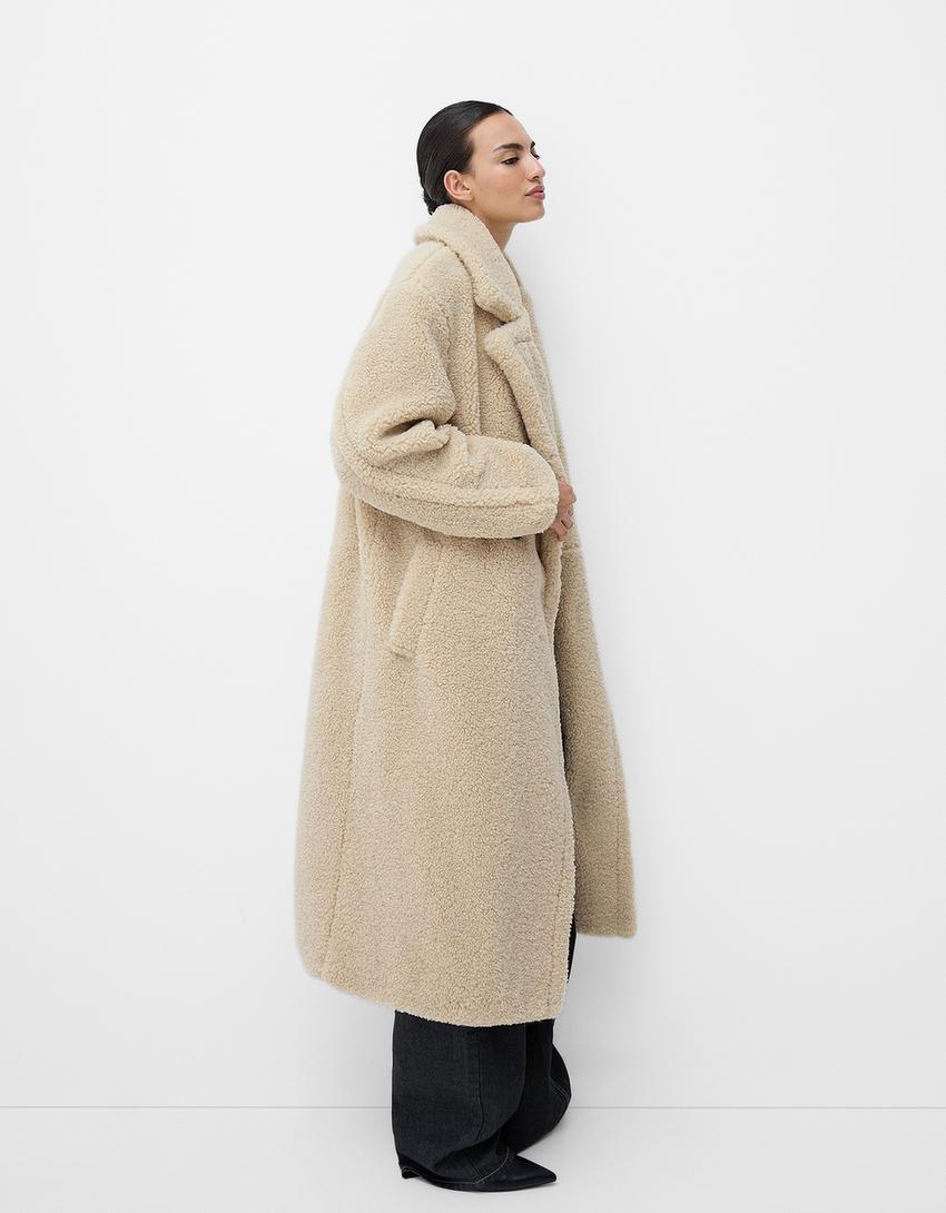 Christina | Twee-rij Teddy-jas met knoopplacket in extra grootte