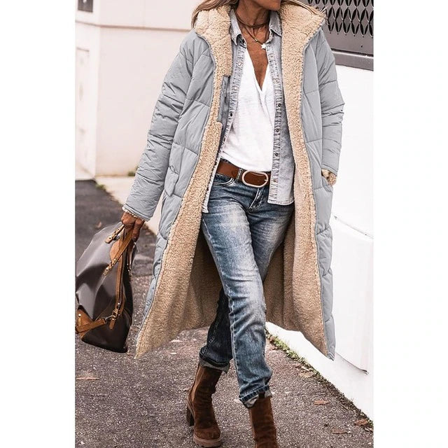 Resist the Coldest Days with Dorine's Luxurious Long Coat!