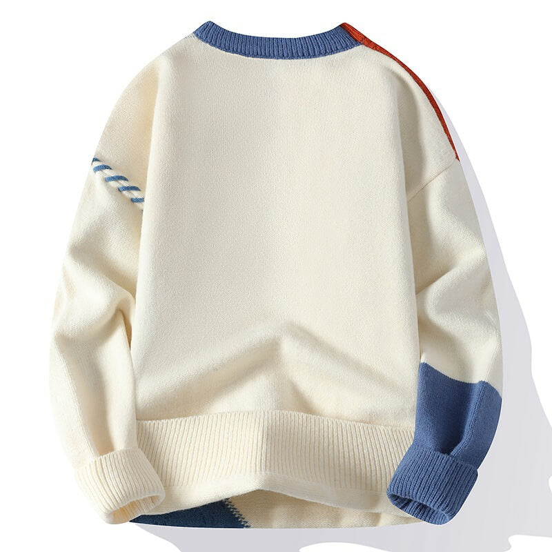Frostina comfortabele sweater in crème met kleurrijke accenten op de schouders en mouwen, een zachte en warme textuur die perfect is voor ontspannen dagen.
