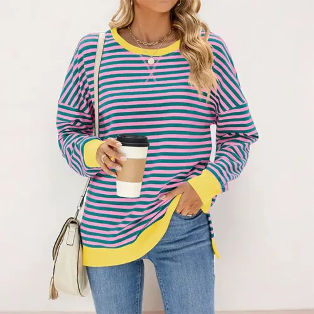 Havello stijlvolle trui met turquoise-roze strepen en gele boorden. Deze warme, comfortabele trui voegt een speelse en modieuze touch toe aan je outfit. Perfect te combineren met jeans voor een casual look. Ideaal voor zowel thuis als onderweg.