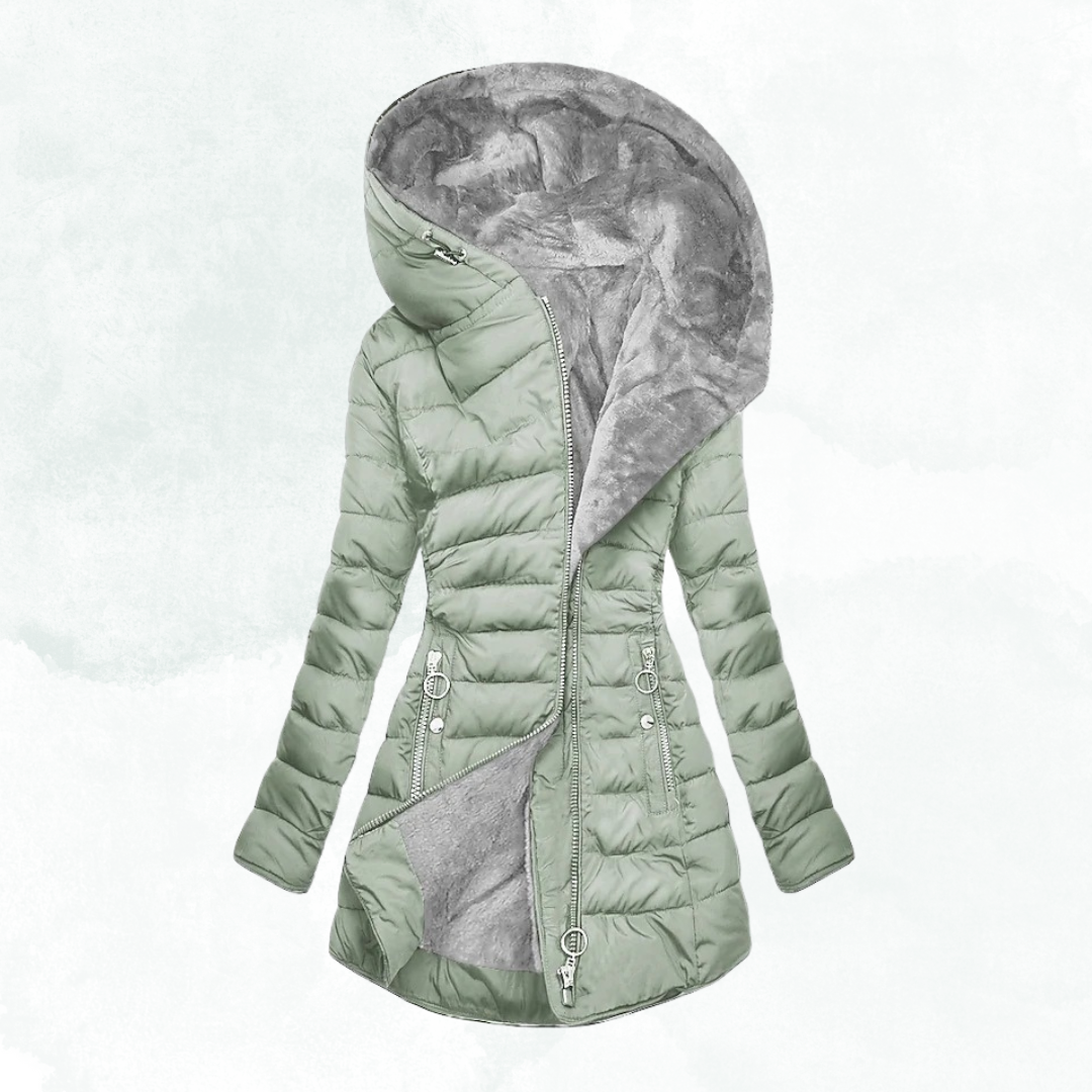 Havenly winterjas in lichtgroen met een fluffy binnenvoering, gewatteerde structuur en een capuchon, ideaal voor extra warmte en comfort in de winter.