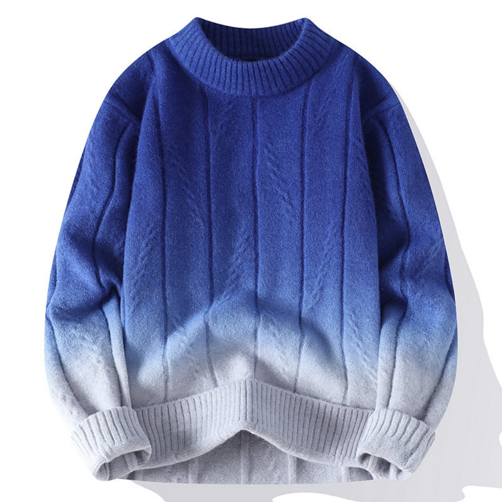 Vooraanzicht van de Haverton trui met een stijlvol blauw-naar-wit kleurverloop. De trui heeft een verticaal gebreid patroon, een comfortabele hoge kraag en geribbelde boorden. Ideaal voor een trendy en warme look tijdens koude dagen.