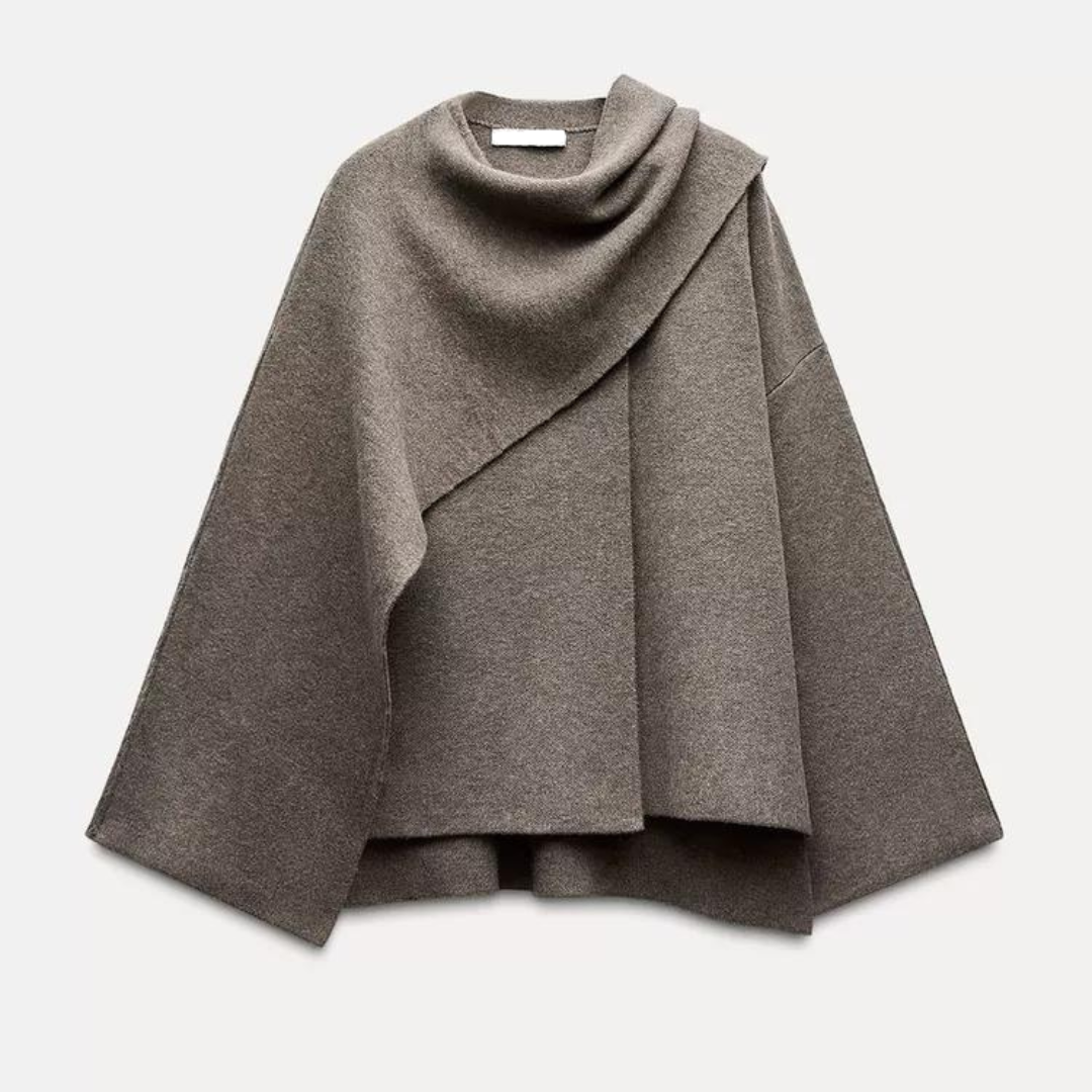 Grijze, stijlvolle cape met een verfijnde drapering. Een tijdloos en elegant kledingstuk voor een klassieke uitstraling.