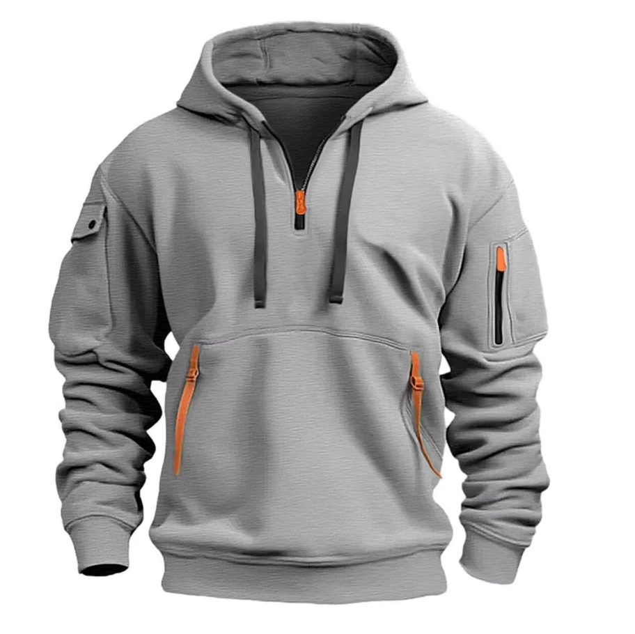Comfortabele grijze hoodie met oranje ritsdetails, ontworpen voor casual stijl. Perfect voor dagelijkse activiteiten en een relaxte look.