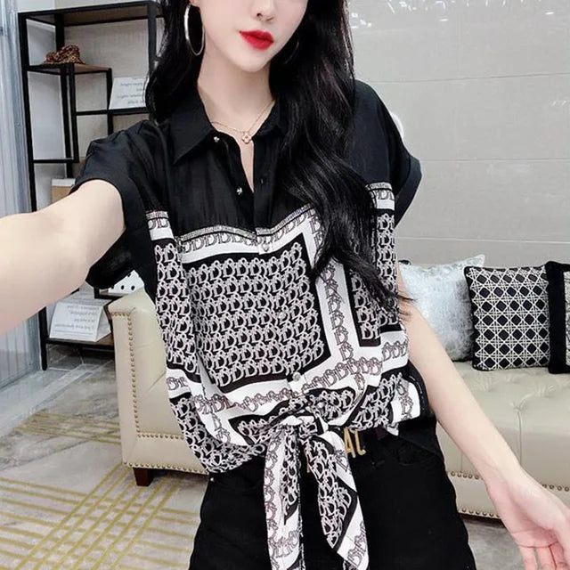 Blusa estiva in chiffon con stampa alla moda