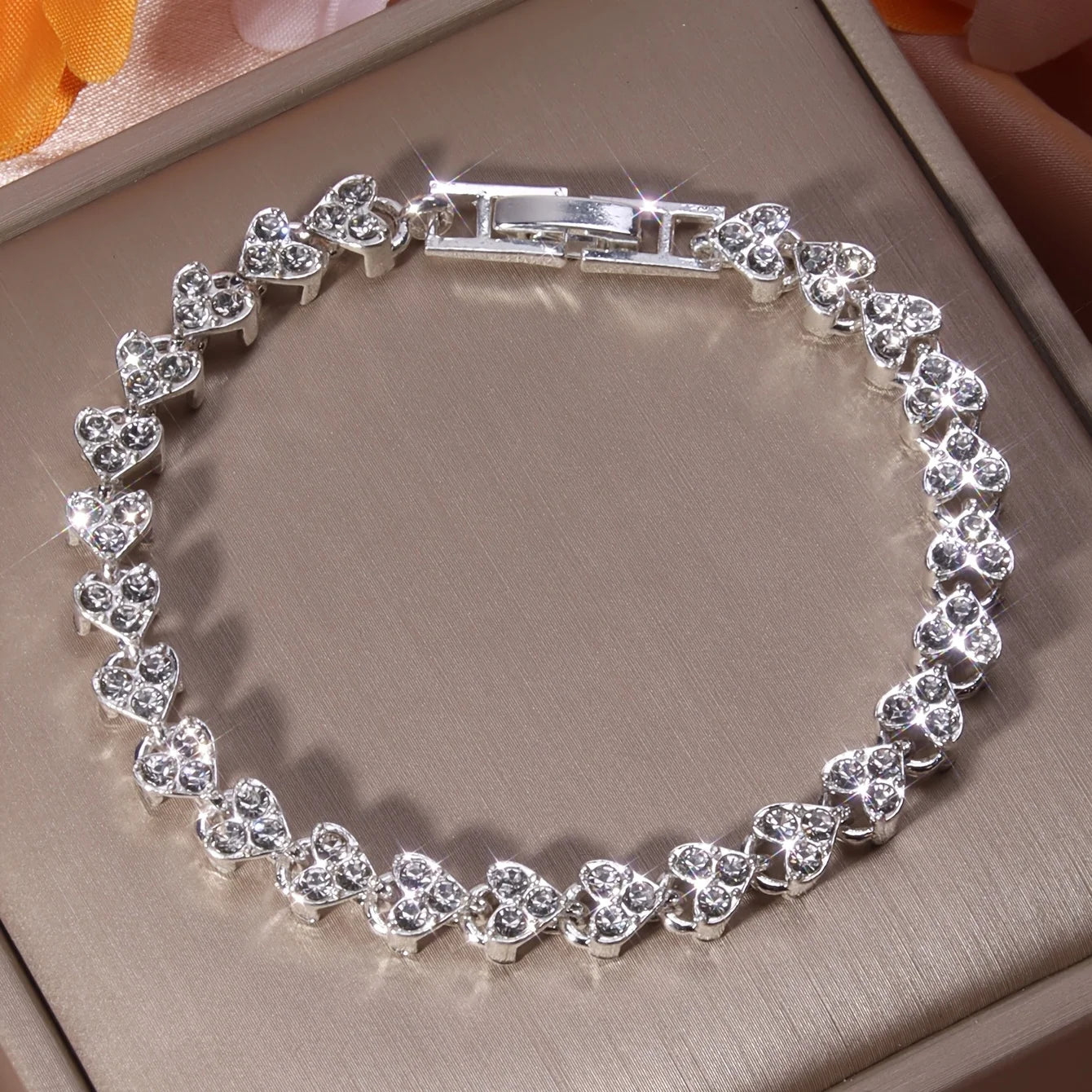 HeartGlow Shimmering Zirconia Heart Beads Bracelet for Women