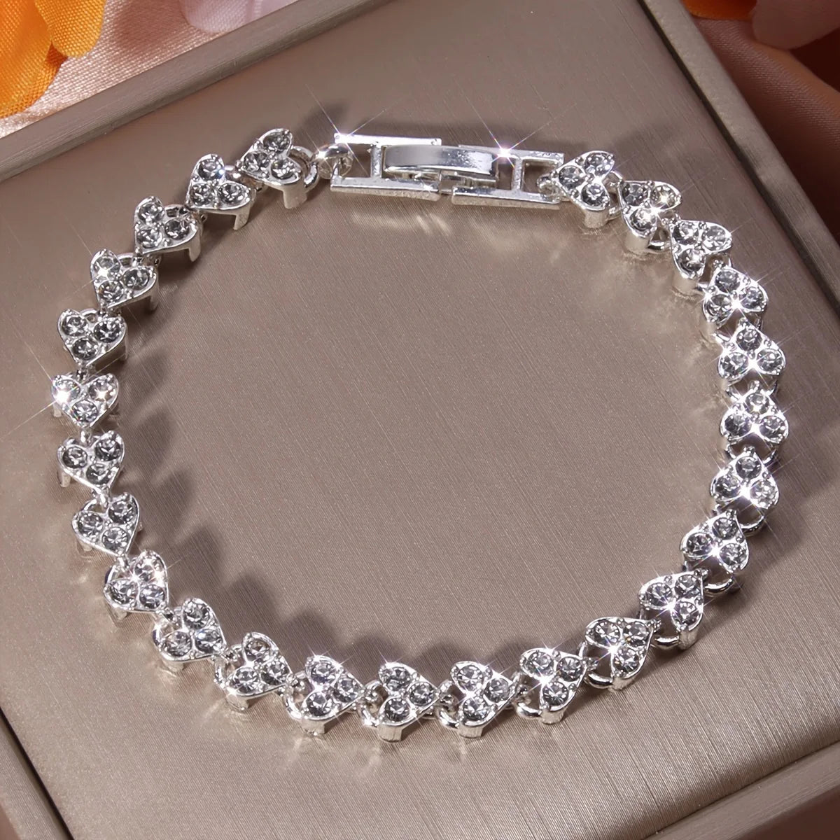 HeartGlow Shimmering Zirconia Heart Beads Bracelet for Women