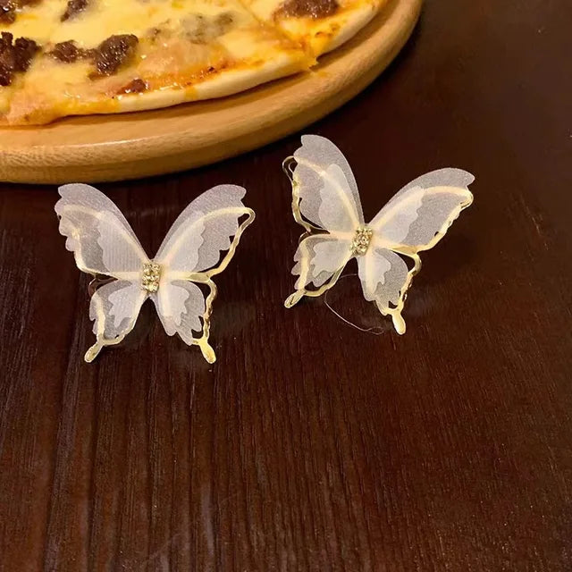 Exzentrische Schwarz-Weiß Hohle Mesh Schmetterling Ohrringe - Lebendige Elegante Accessoires
