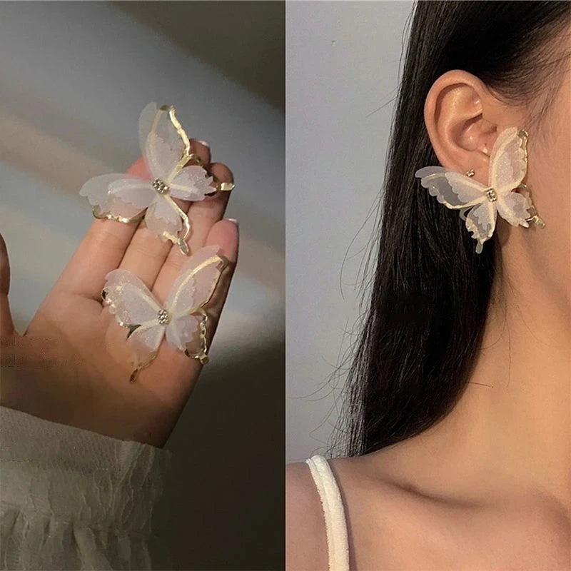 Exzentrische Schwarz-Weiß Hohle Mesh Schmetterling Ohrringe - Lebendige Elegante Accessoires