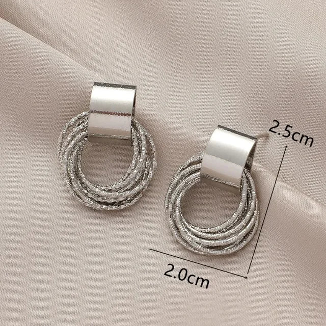 Enchanting Golden Circle Stud Earrings by Brilliant Creations