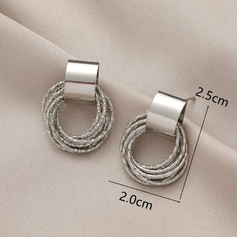 Enchanting Golden Circle Stud Earrings by Brilliant Creations