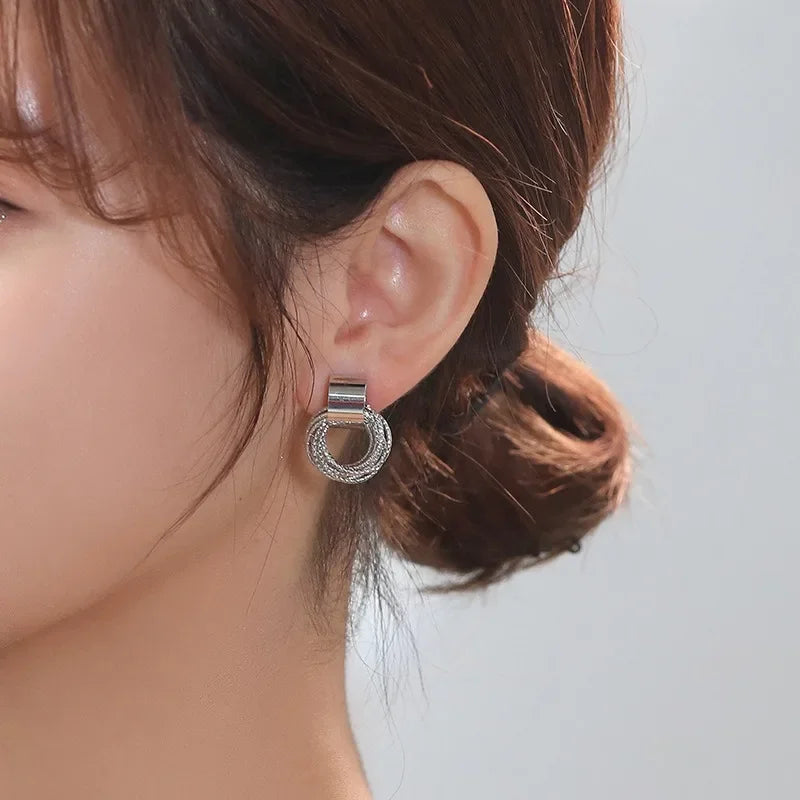 Enchanting Golden Circle Stud Earrings by Brilliant Creations