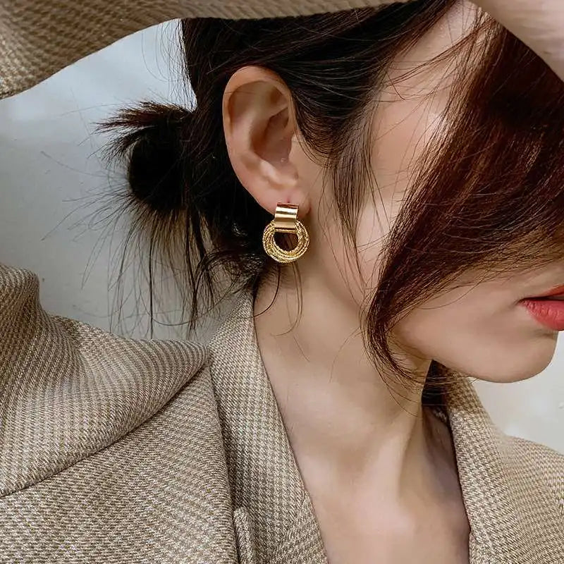 Enchanting Golden Circle Stud Earrings by Brilliant Creations