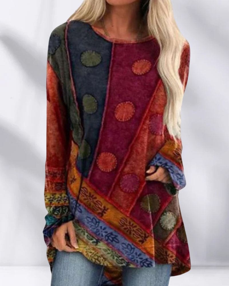 Uniek en kleurrijk Retro topje Topje (Vintage) Comfortabel met een speels patchworkdesign en ronde hals. De losse pasvorm zorgt voor ultiem comfort, terwijl de artistieke patronen en warme tinten een bohemian uitstraling geven. Perfect voor een casual en trendy look.