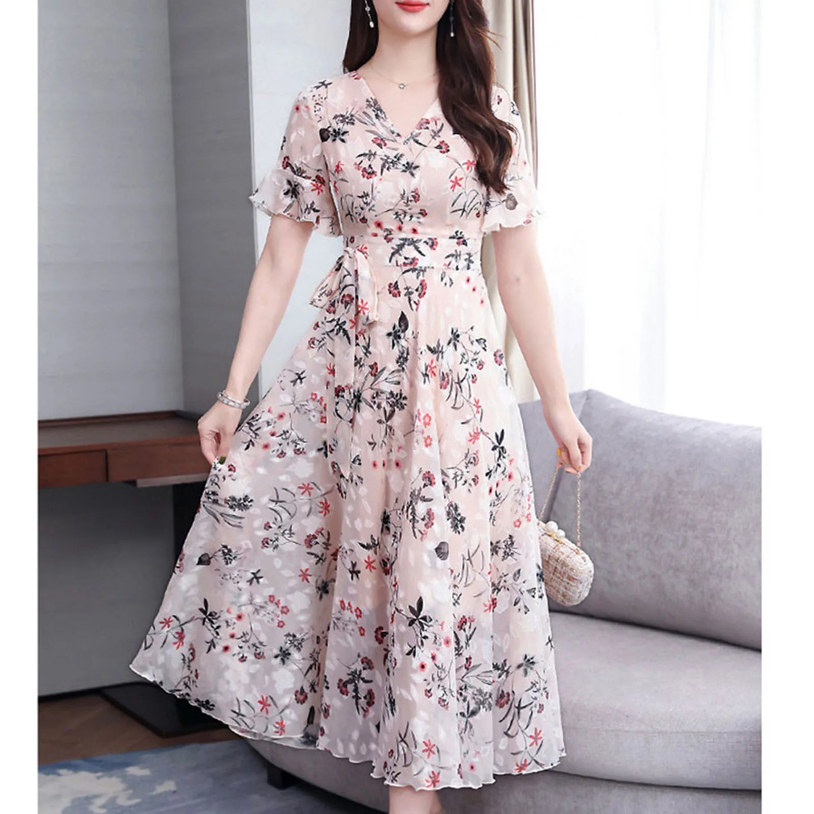 Elegante vestito di lucentezza dorata