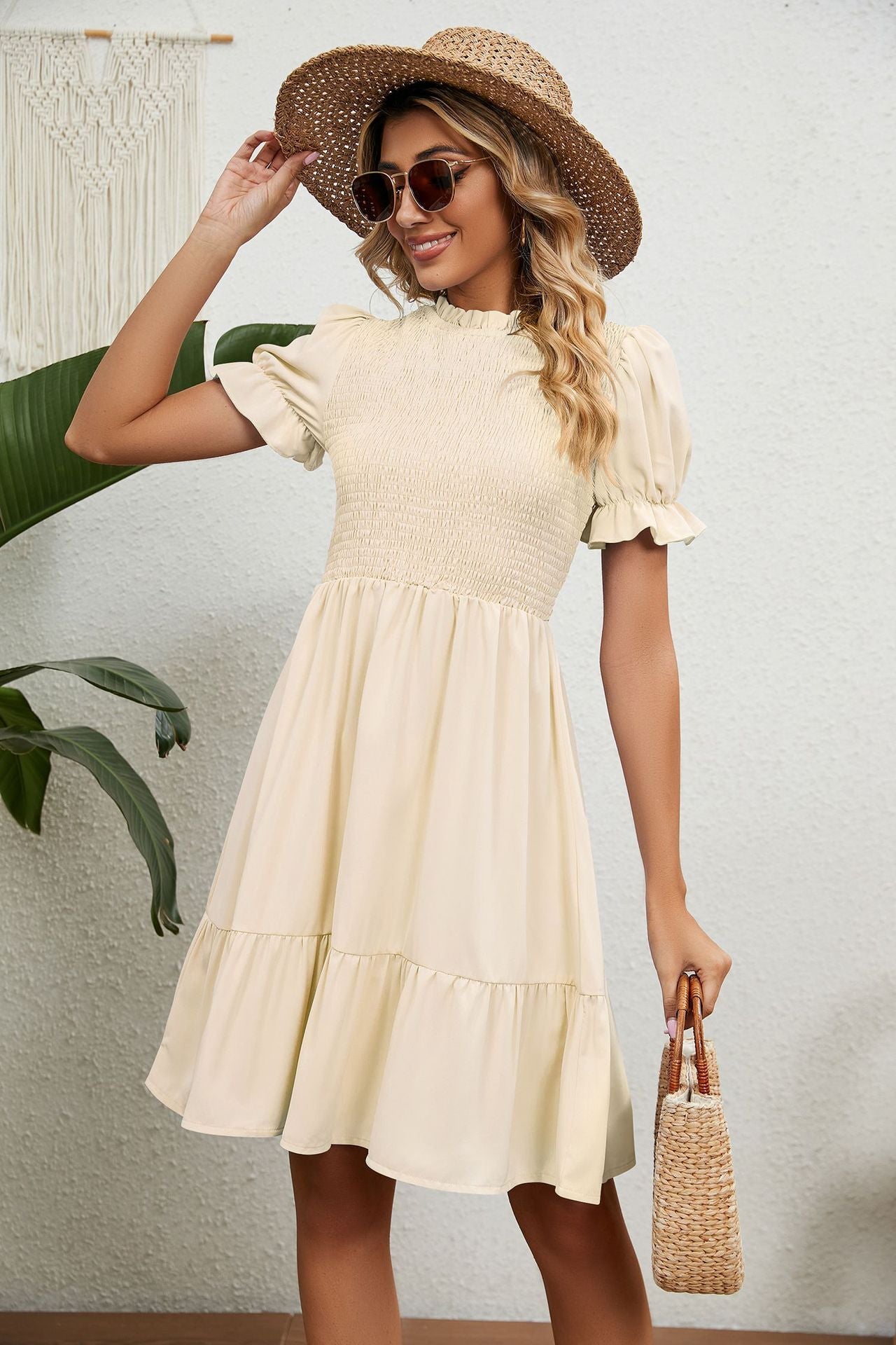 Vestito estivo beige con frange