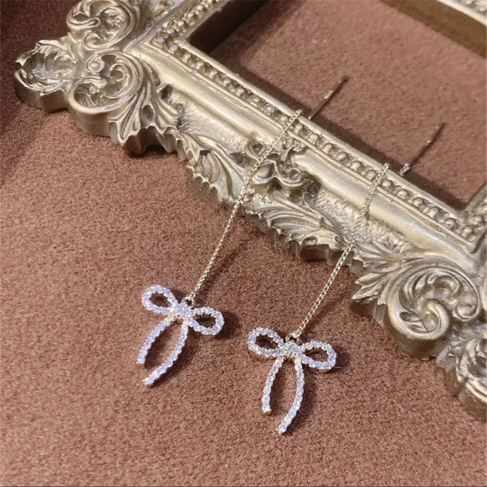 Elegant Silver Needle Bow Earrings