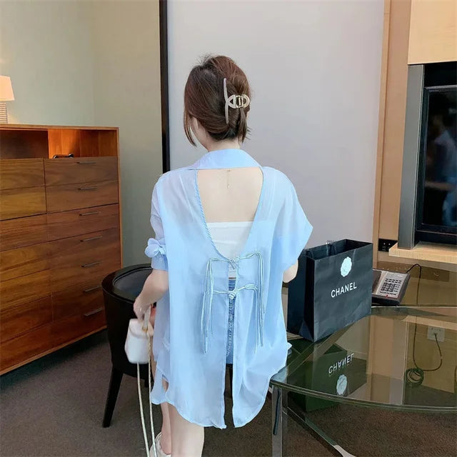 Top estivo protettivo solare azzurro cielo per donna