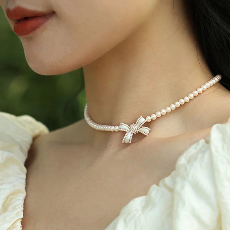 Aurora Elegantie Ketting met Strik Hanger