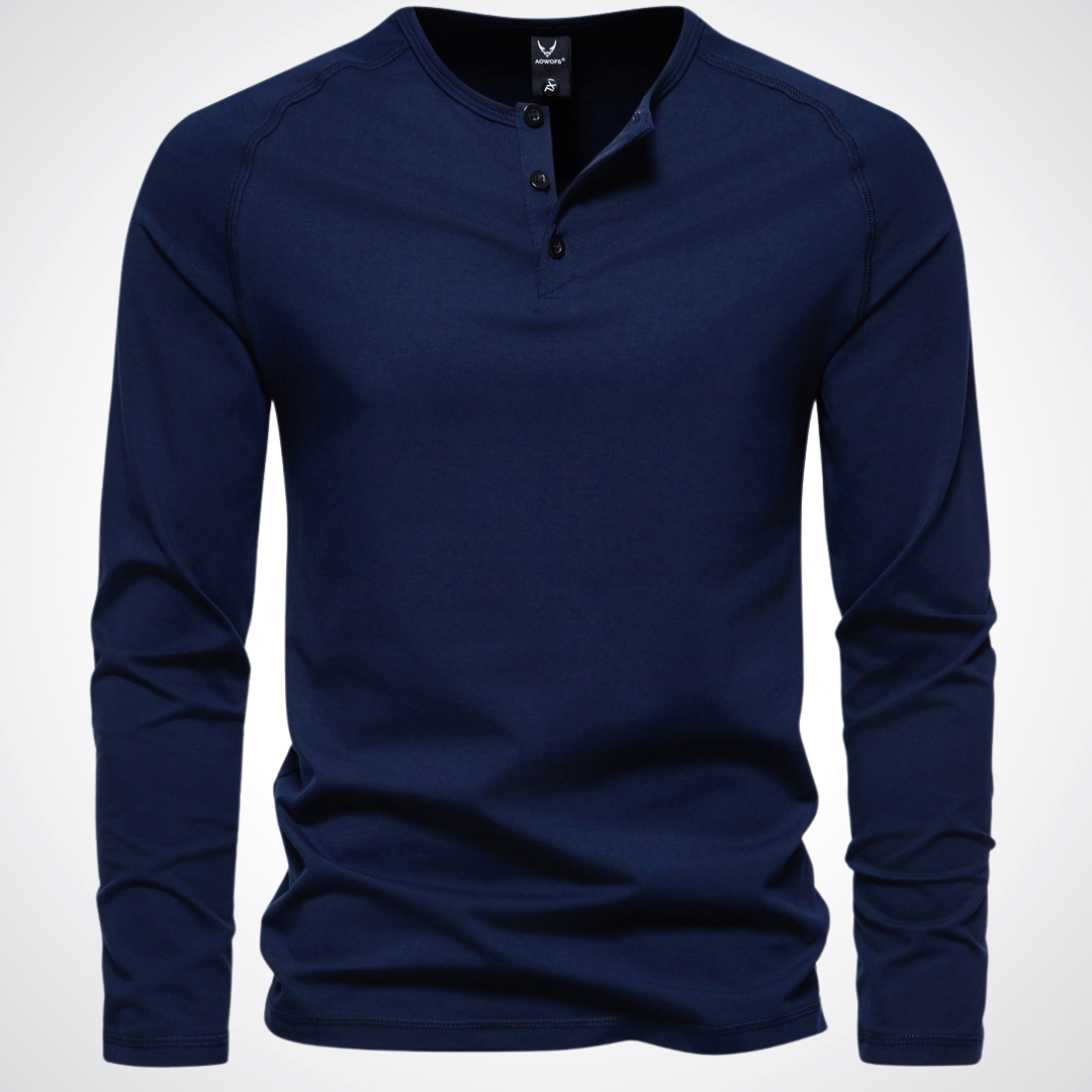 Unero comfortabel hemd met lange mouwen in marineblauw. Het hemd heeft een stijlvol design met een knoopsluiting bij de hals, een relaxte pasvorm en voelt zacht aan, ideaal voor casual en dagelijks gebruik.
