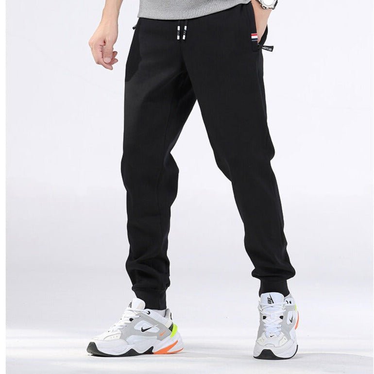 UptoFit  Zwarte joggingbroek voor heren, stijlvol en comfortabel. Perfect voor een casual look, met een sportieve uitstraling en elastische boorden voor een goede pasvorm.