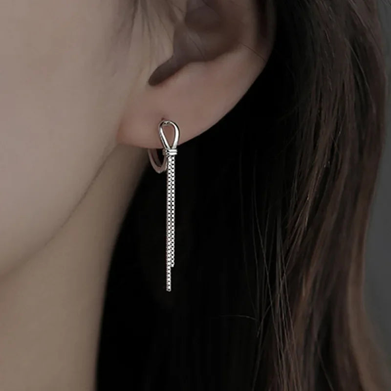 Voq Orecchini con Nappine Intrecciate Argento