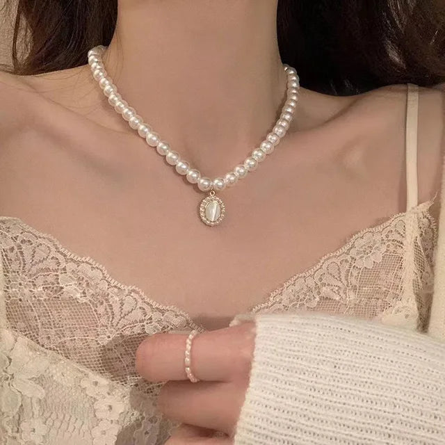 Collana doppia Nova con fiocco e ciondolo a cuore