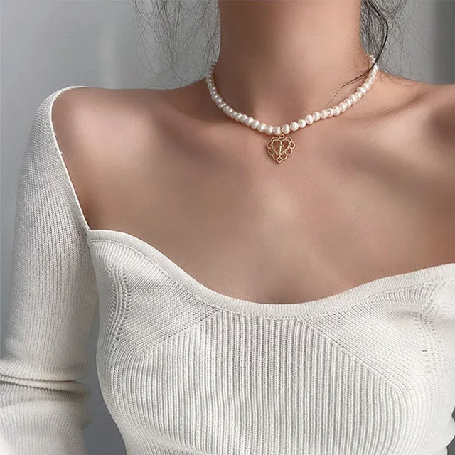 Collana doppia Nova con fiocco e ciondolo a cuore