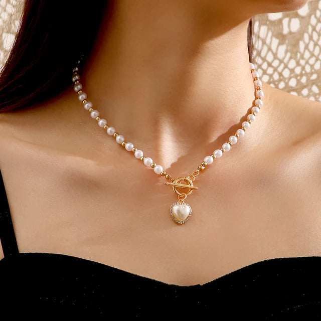 Collana doppia Nova con fiocco e ciondolo a cuore