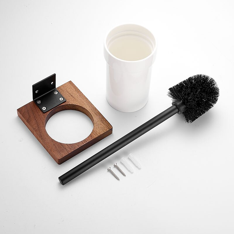 Zietto toiletborstelset in losse onderdelen: zwarte borstel met handvat, witte houder, houten wandsteun met metalen beugel en montagemateriaal (schroeven en pluggen). Een functionele en stijlvolle oplossing voor een net en hygiënisch toilet.