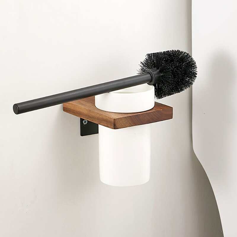 Zietto toiletborstelset met modern design, bestaande uit een zwarte borstel, witte houder en houten wandsteun. Stijlvolle en functionele toevoeging aan de badkamer of toilet voor een opgeruimde en hygiënische uitstraling.